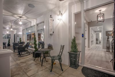 Welcoming outdoor seating area with chairs and a table
