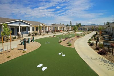 Outdoor space with walking paths and gardens