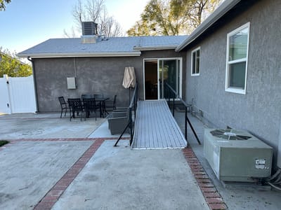 Outdoor ramp leading to an accessible entrance