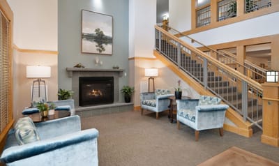Cozy common area with seating and fireplace