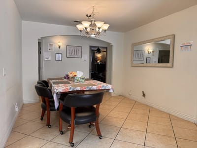 Dining area with a table set and decorative elements