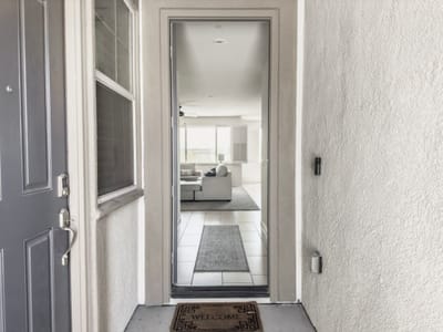 Entrance doorway leading into a bright lobby