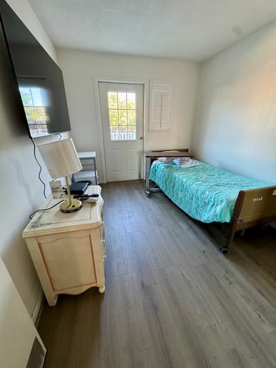 Cozy private room with a bed and window