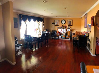 Bright common area with dining table and seating