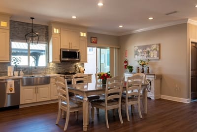Interior dining area with a large table and chairs