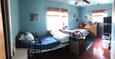 A shared resident room with twin beds and decor