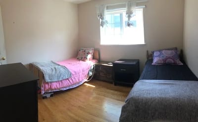 Shared resident room with two beds and furniture