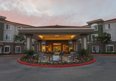 Exterior view of the facility entrance with landscaping