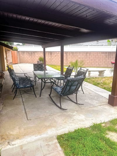 Outdoor seating area with chairs and a table