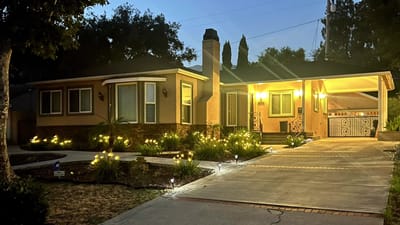 Exterior view of the Fairway Assisted Living facility at night