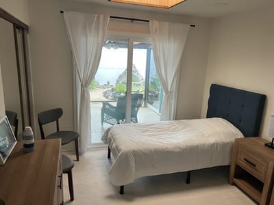 A cozy resident room with outdoor view