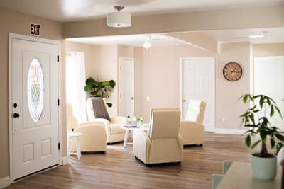 Bright common area with seating and plants