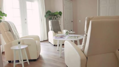 Bright and inviting interior common area with chairs