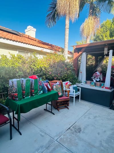 Outdoor gathering with decorated tables for a festive event