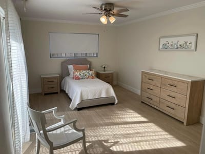 Well-furnished private resident room with natural light