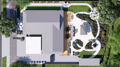 Aerial view of a senior care facility with gardens and patios