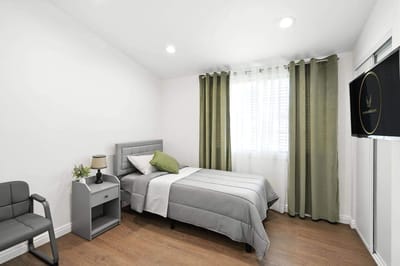 Bright, cozy resident room with natural light