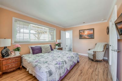 A cozy bedroom setup in a senior living facility
