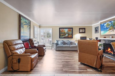 Comfortable common area with seating and artwork