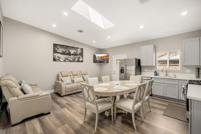 Bright and modern interior living space with a dining table
