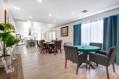 Common area with dining tables and chairs