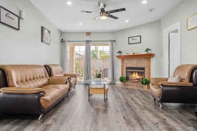 Cozy common area with seating and a fireplace