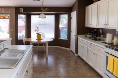 Bright kitchen area with a dining table