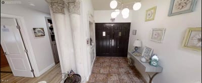 Entrance hallway of a senior care facility with decorative elements