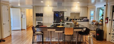 Bright communal kitchen area in the facility