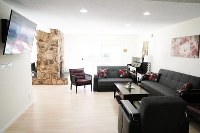 Interior view of a cozy common area with seating