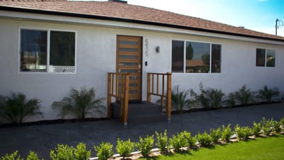 Exterior view of the facility with entrance and landscaping