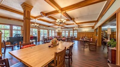 Interior view of a dining room with wooden decor