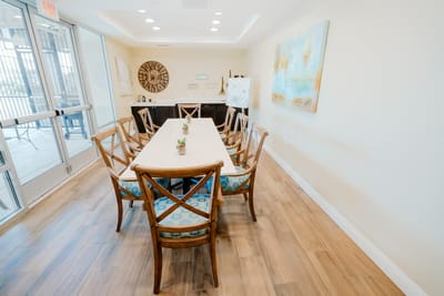 Bright interior dining area with a large table