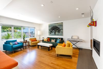 Bright common area with colorful furniture