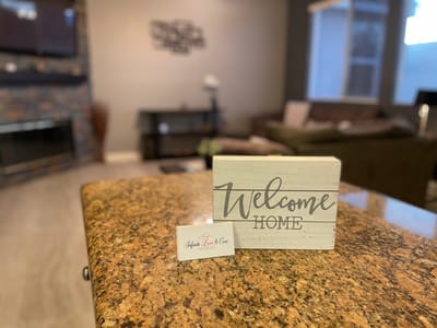 Interior space with a welcome sign and business card