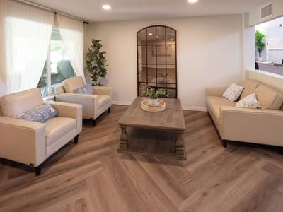 Bright, inviting common area with seating