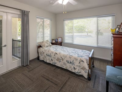 Cozy private bedroom with natural light