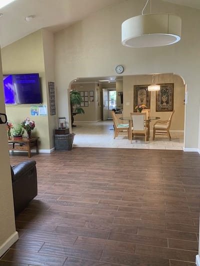 Bright common area with dining table and seating