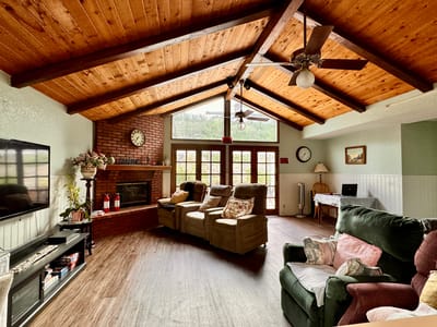 Cozy common area with comfortable seating and a fireplace