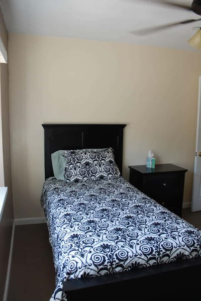 Well-furnished resident room with single bed