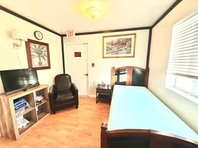 Comfortable private resident room with basic furnishings