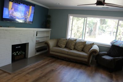 Cozy common area with a couch and television