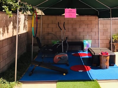 Outdoor exercise area with fitness equipment