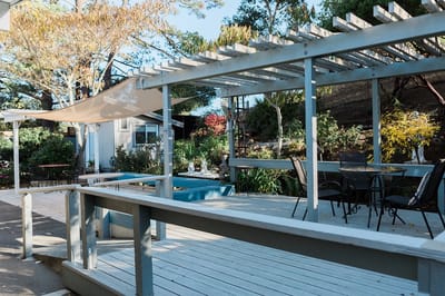 Outdoor patio with seating and shaded areas