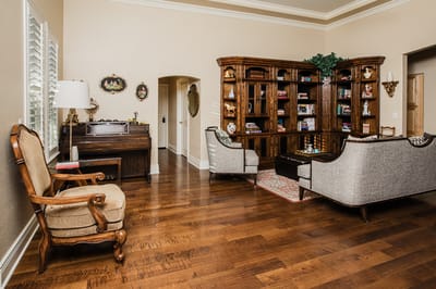 Cozy common area with comfortable seating and bookshelves