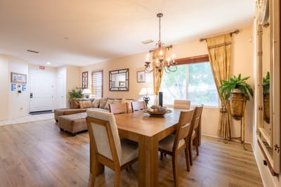 Cozy dining area with wooden table and chairs