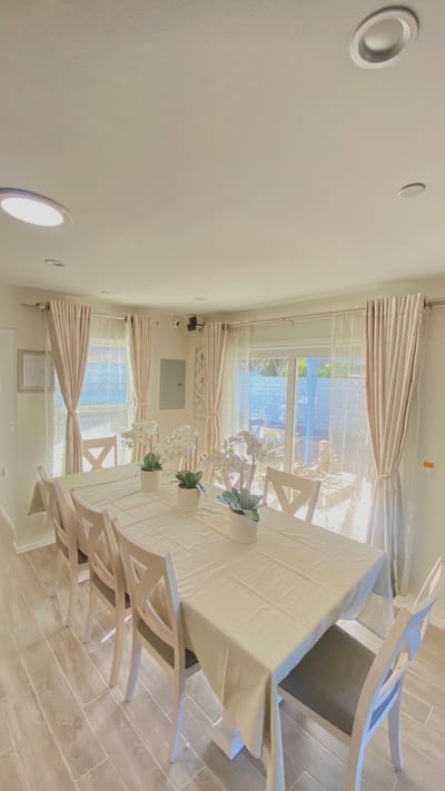 Bright dining area with natural light and elegant decor
