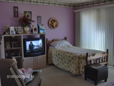 Interior view of a cozy bedroom with furnishings