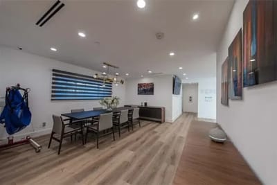 Modern interior view of a common area with a dining table