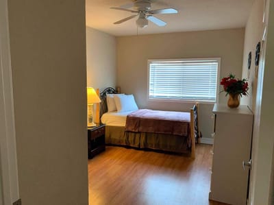 Cozy private room with bed and window